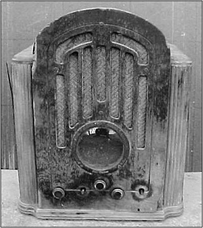 The cabinet of the RCA shows the extent of the water damage