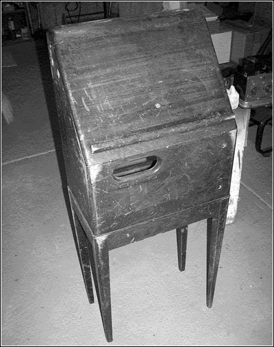 The cabinet before restoration.