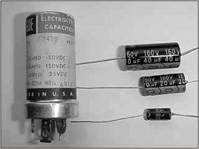 three electrolytic capacitors