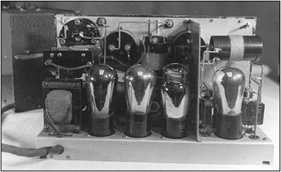 The Model T-22 transmitter with its rear cover removed