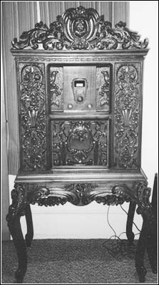 This ornate Howard Model 5-A highboy console