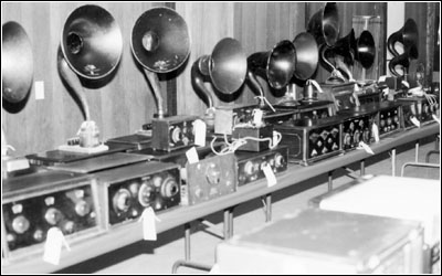 �A sampling of battery radios and horn speakers