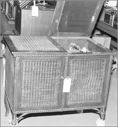 a Perfectone phonograph in a wicker cabinet